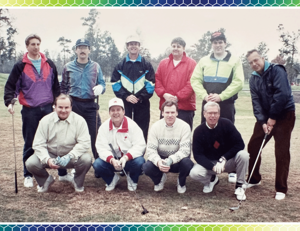Andy Hill and Ron Hill golfing with other members of the tech industry